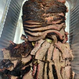 Sliced house-smoked beef brisket